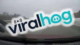 Car Spins out on Slick Roads and Dodges all Traffic || ViralHog