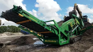 McCloskey R230 Scalping Screener into ST100T Track Stacker producing 500 TPH of Fill Dirt