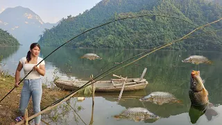 Girl fishing on the lake, daily life survival.