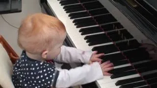 Amazing one year old child plays a piano concert