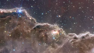 4K Webb Space Telescope Fly-Through “Cosmic Cliffs” in the Carina Nebula (NIRCam + MIRI Composite)