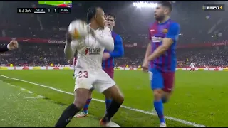 Jules Kounde recieved a straight red card for throwing the ball at Jordi Alba's face