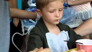 Funny Kid at Theme Park does Not Want to Take a Nap