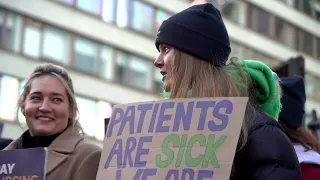 Workers in Britain stage biggest ever NHS strike