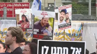 Relatives of hostages held by Hamas protest outside Israel's military headquarters in Tel Aviv