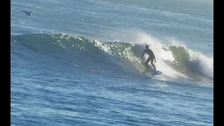 Learning to surf a 6'8 Seaside Beyond in Santa Cruz