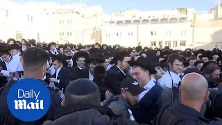 Ultra-Orthodox Jews clash with police over women at the Western Wall