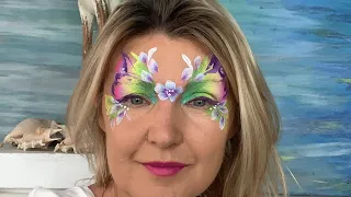 Fast and easy rainbow butterfly face paint tutorial.