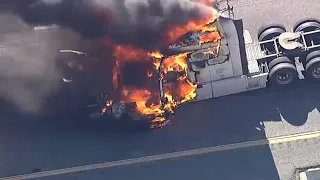 Stolen big rig engulfed in flames at end of police chase