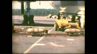 Loading Convair B-36 Peacemaker with 500# bombs and dropping them on range