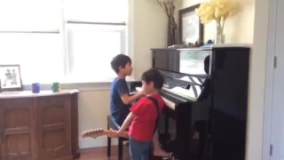 7 year old plays Piano Man-Billy Joel