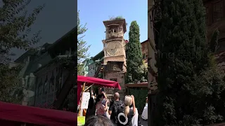 #leaning#clock#tower#tbilisi#georgia#puppettheatre#puppeteer#Rezo#Gabriadze#angel#strikes#the#bell