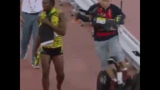 Usain bolt knockdown by a cameraman