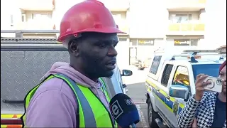 Survivor Moses briefly spoke to the media on the building that crashed at Victoria Street