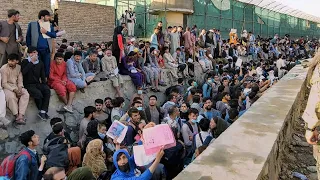 Desperate Afghans queue in sewage-filled canal outside Kabul airport | Latest English News | WION