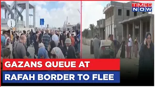 Palestinians Line Up At Rafah Border To Flee Warzone After Israel Attacked South Gaza | World News