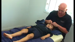 How to massage children. Naturopath Brandon Raynor massages his 3 year old daughter.