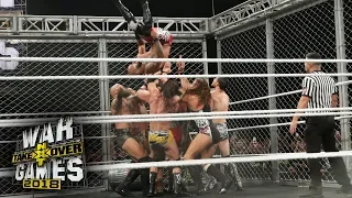 Ricochet performs a double Moonsault from the top of the WarGames Cage: NXT Takeover: WarGames II