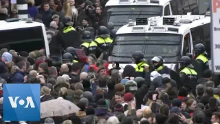 Police Scuffle with Protesters at Amsterdam Protest