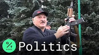 Lukashenko carries Rifle into Belarus Presidential Palace as Protesters Swarm