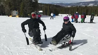 Wheelchair Users Trying Adaptive Alpine Snow-Skiing