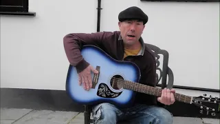 Strumming & playing guitar song called Till you know Jesus by Norman J Miller