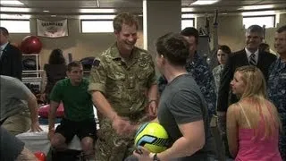 Prince Harry visits injured soldiers at Walter Reed