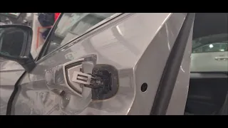 how to remove a 2018 Tiguan door handle...