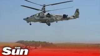 Russian attack helicopters 'destroy Ukrainian armoured vehicles'