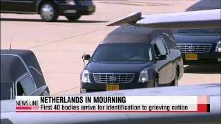 First bodies of MH17 victims arrive in Netherlands