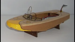 Herkimer "OK" CO2 motor in vintage Squirt boat