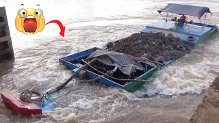 [720] Dramatically, powerful boats go upstream through the dam gate