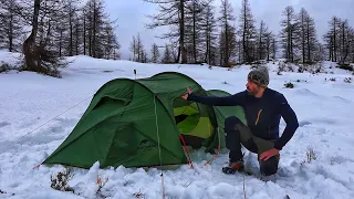 Night in a heated tent with a gas stove. Italian Alps, 2000 mt.