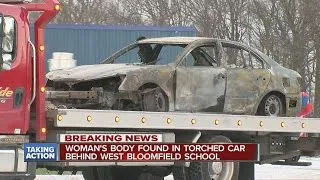 Woman's body found in burned out car