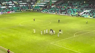 CELTIC FANS CELEBRATING WITH ANGE POSTECOGLOU AFTER BEATING DUNDEE 3-2