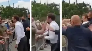 Emmanuel Macron slapped in the face by member of public