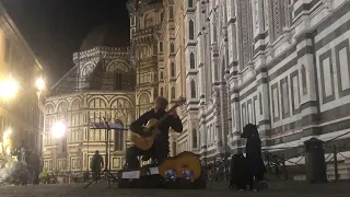 Busking outside the Duomo in Florence Italy - April 2023.