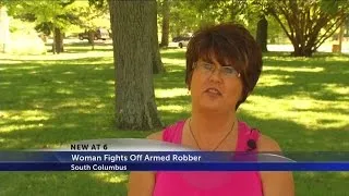 Woman fights off robber