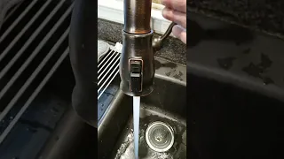 Water flow after screen cleaned in kitchen faucet.