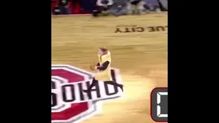 Guy in hotdog costume hits half court shot at Ohio State! 😱