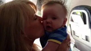 Baby kissing his grandmother - very funny