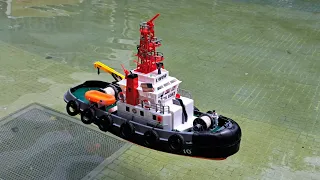 Heng Long   RC Workboat . Little modified with Safeboat painting and figure increased.  2024