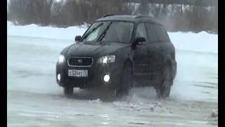 Subaru Outback 3.0 drifting on iced lake