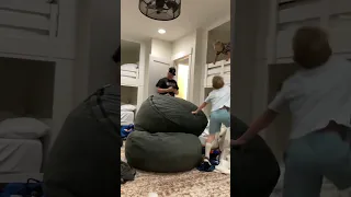 3 year old boy throws over a huge tantrum because his cousin was on the bean bag