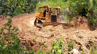 Excellent work of Caterpillar D6R XL bulldozer operators working to clean and smooth plantation road