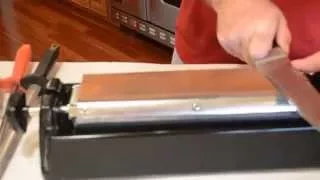 How to sharpen a knife like a butcher, using an oil stone.
