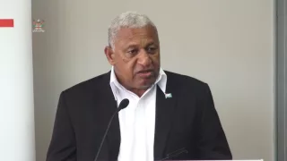 Fijian Prime Minister Voreqe Bainimarama, presents cheques Fiji 7s Rugby team