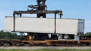 The Hypnotic Loading Process of Massive Train Wagon Flat Cars