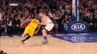 LeBron dunks over Lou Amundson & Kristaps Porzingis