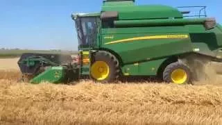 IPSO Agricultura- Combină John Deere W440 la lucru în campania de recoltare păioase